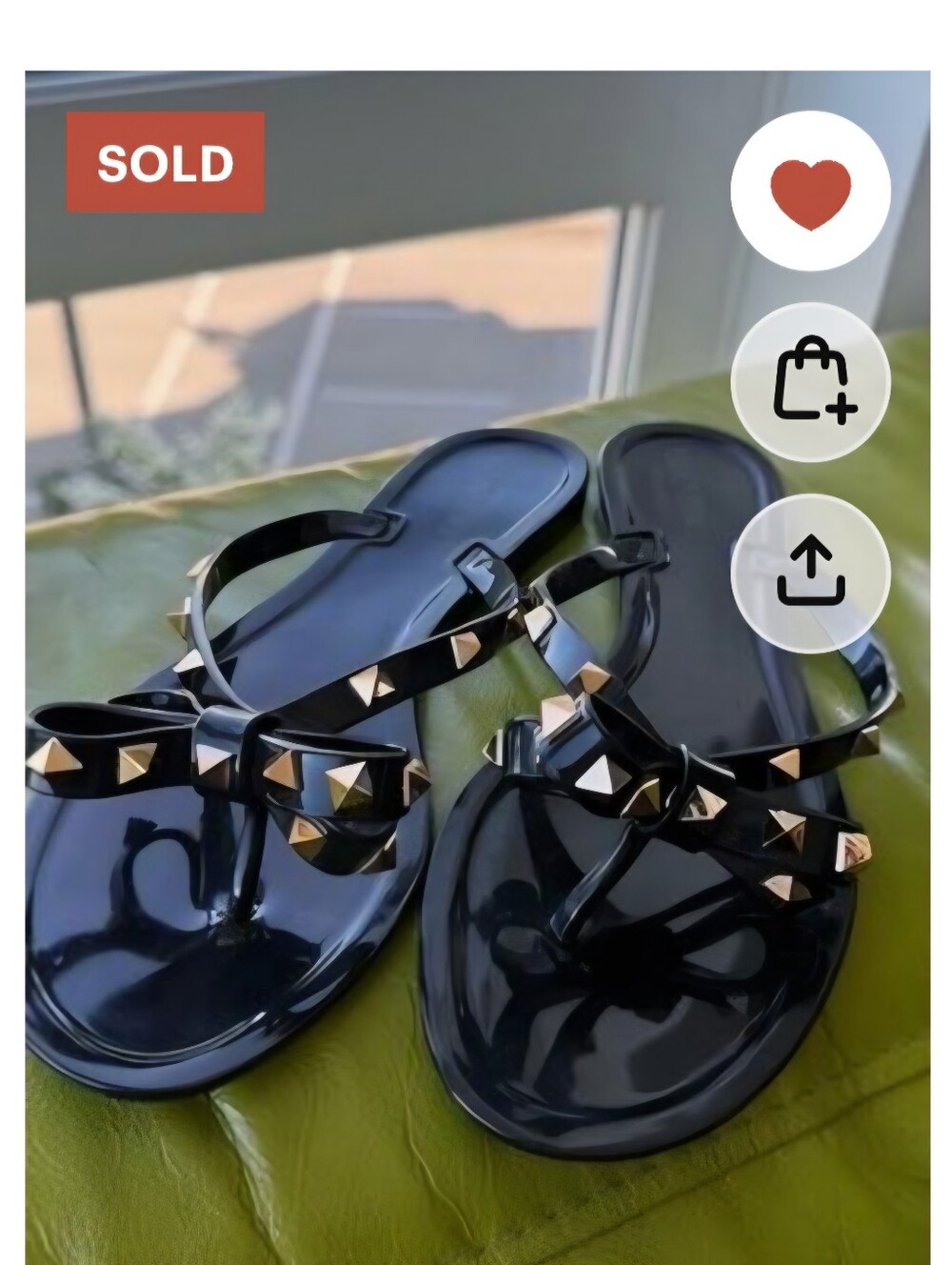 Valentino Garavani Black Jelly Thong Sandals with Gold Rockstuds
